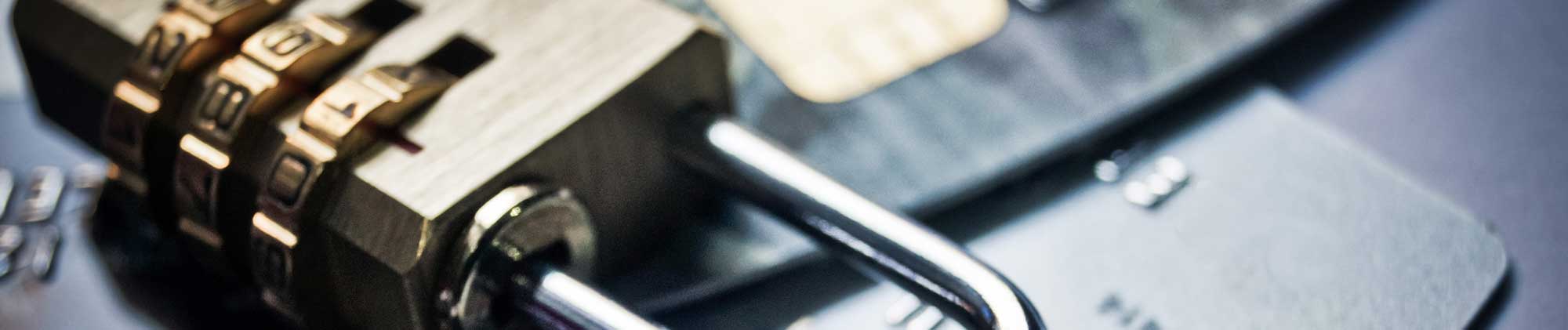 security lock on credit cards representing data encryption to prevent data theft